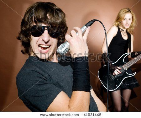stock-photo-rock-singer-with-woman-during-in-studio-41031445.jpg